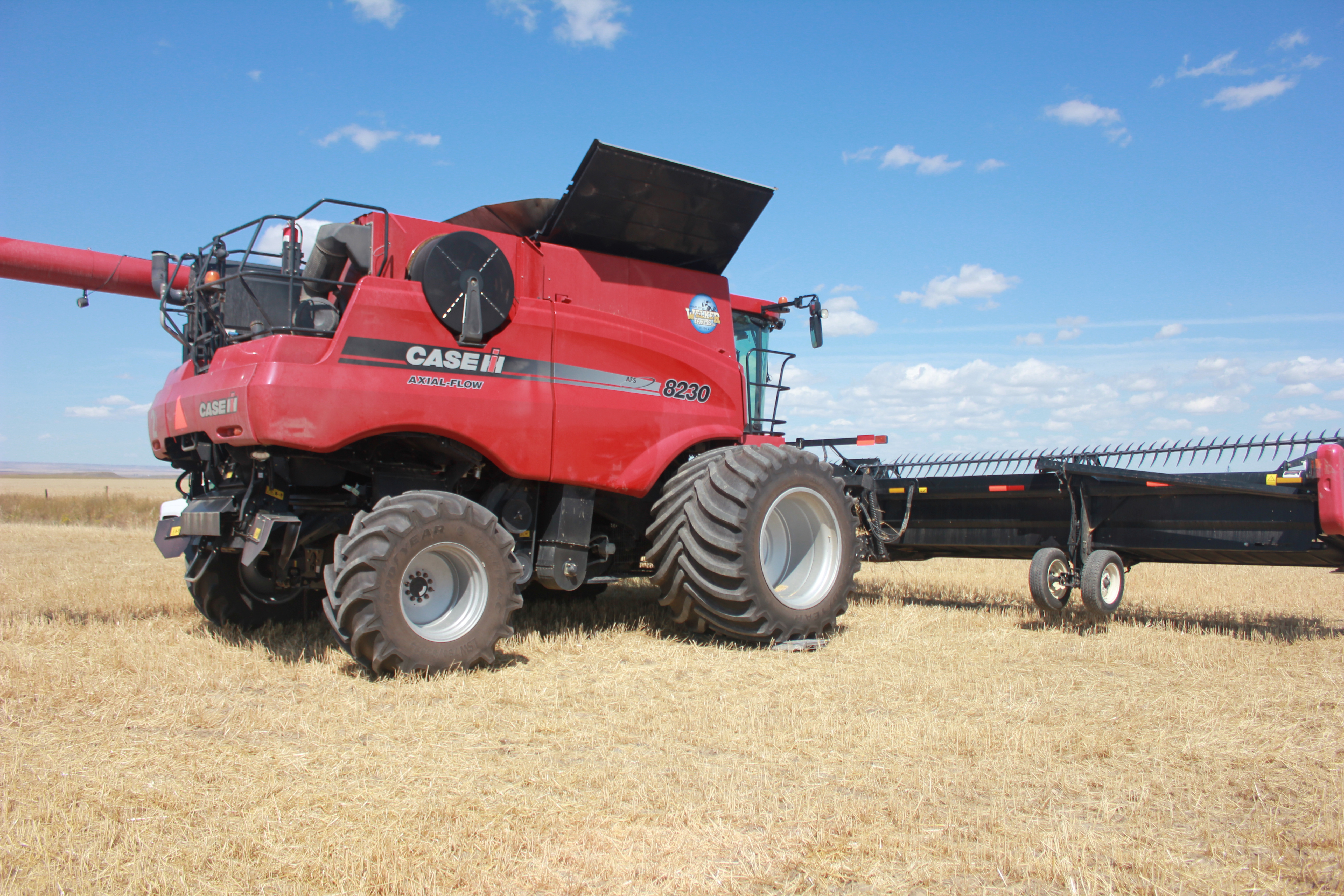Case Combine with LSW Goodyear Farm Tires